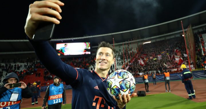 BELGRADE, SERBIA - NOVEMBER 26: Robert Lewandowski of FC Bayern Munich celebrates with the match ball following his four goals during the UEFA Champions League group B match between Crvena Zvezda and Bayern Muenchen at Rajko Mitic Stadium on November 26, 2019 in Belgrade, Serbia. (Photo by Lars Baron/Bongarts/Getty Images)